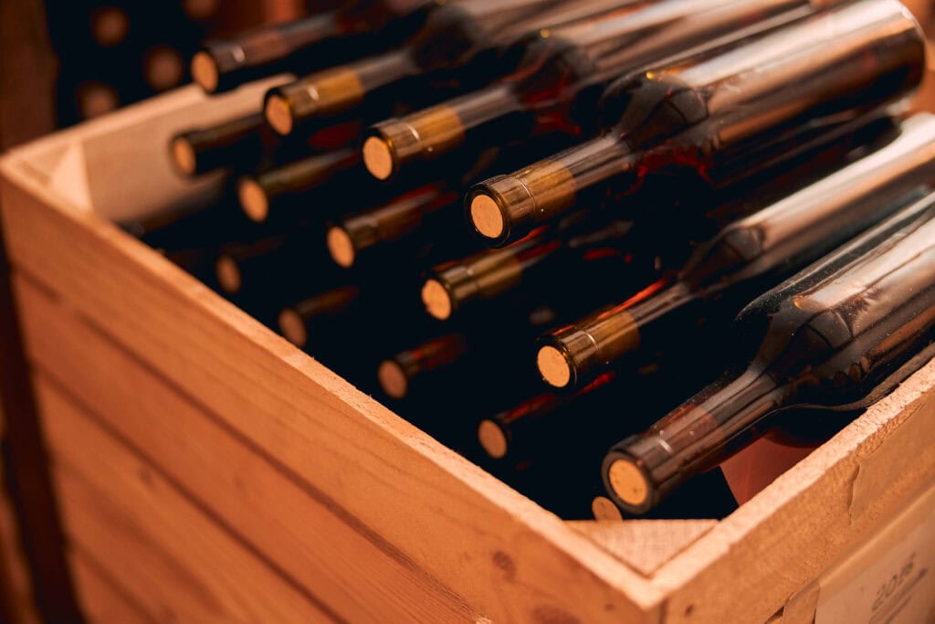bottles_of_wine_with_corks_in_wooden
